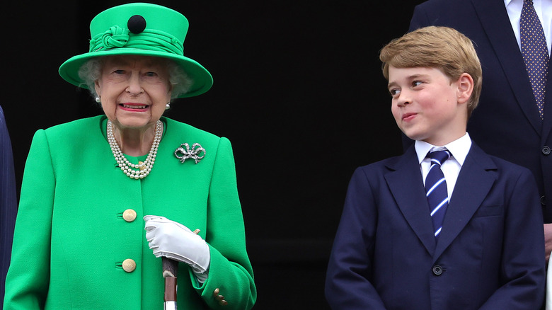 Prince George smiling at Queen Elizabeth II