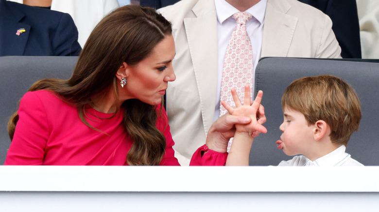 Prince Louis sticking out tongue at Princess Catherine at Platinum Jubilee