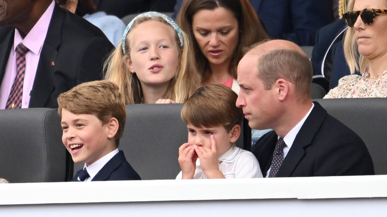Prince George and Prince Louis with Prince William in audience