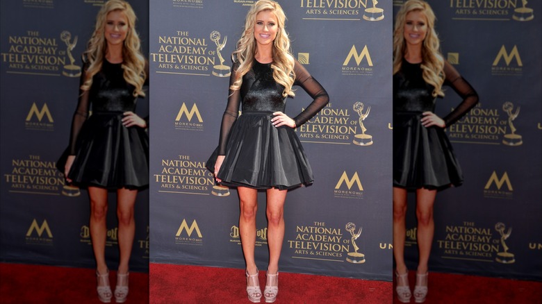 Christina Haack smiling with hand on hip