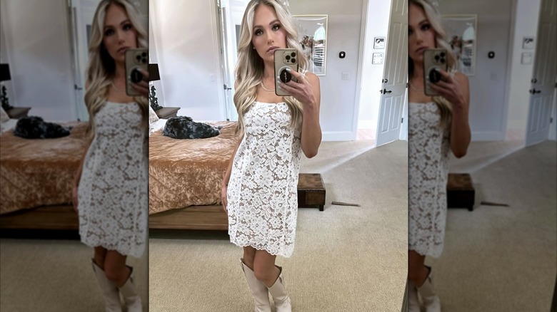 Tomi Lahren takes a selfie in a bedroom (2025)