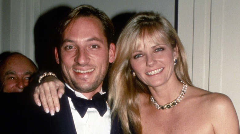 Anthony Peck posing with Cheryl Tiegs.