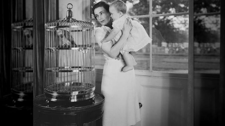 Alice, Duchess of Gloucester holding her son, Prince William