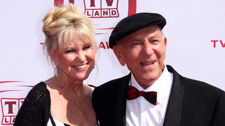 Peggy Crosby and Jack Klugman smiling while posing together at a TV Land event