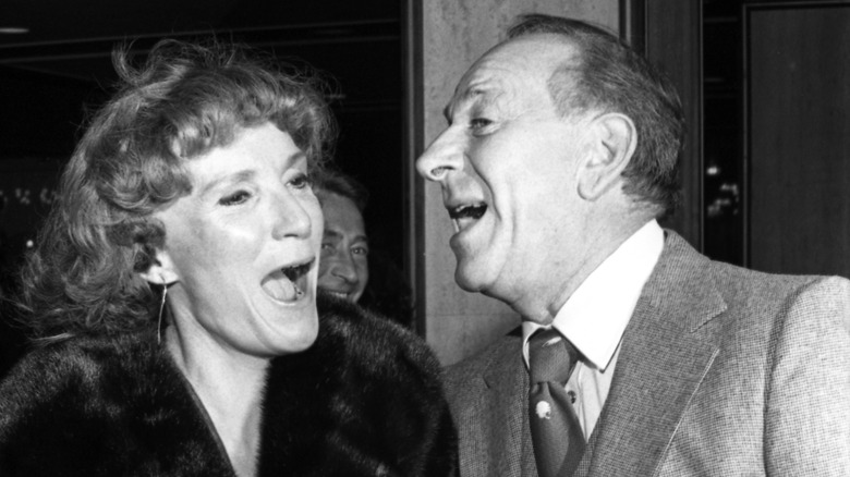 Black-and-white photo of Brett Somers and Jack Klugman laughing