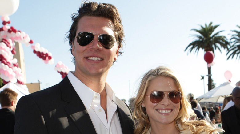 Hayes MacArthur and Ali Larter smiling
