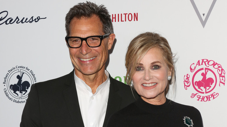 Michael Cummings and Maureen McCormick smiling