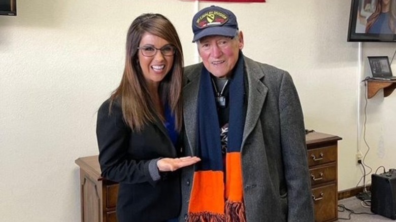 Lauren Boebert poses alongside a constituent in Huerfano County, CO (2022)