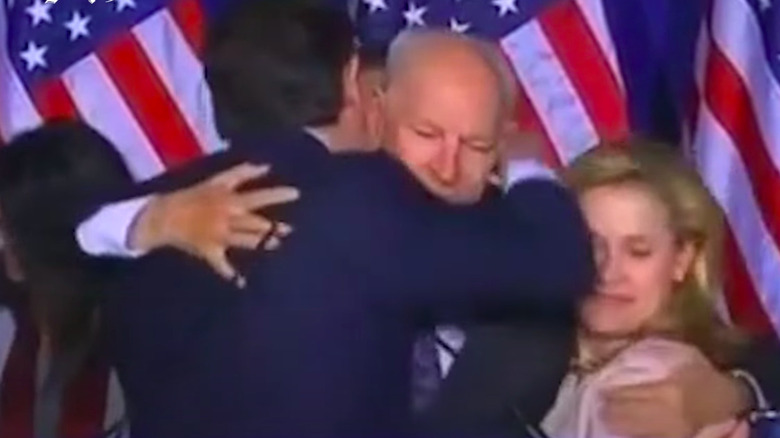 Ted Cruz elbowing Heidi Cruz
