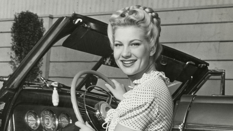 Woman smiling in car