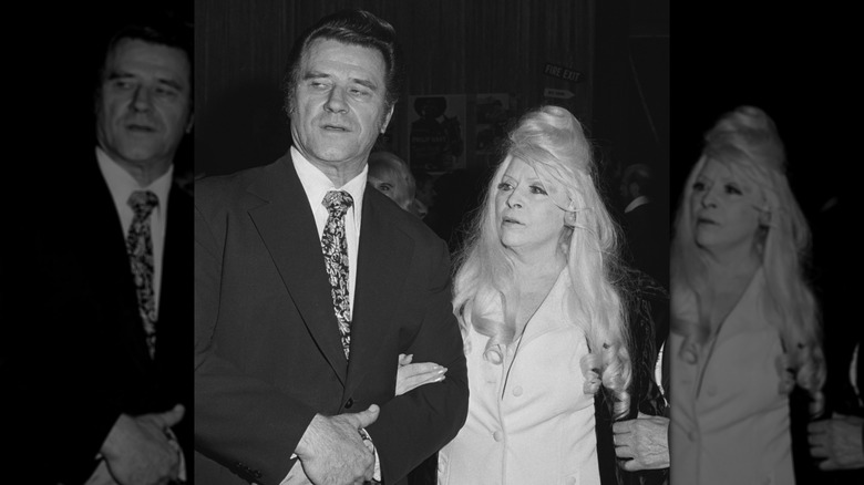 Mae West holding onto Paul Novak.