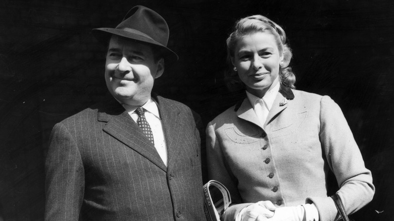 Roberto Rossellini & Ingrid Bergman smile for photographers