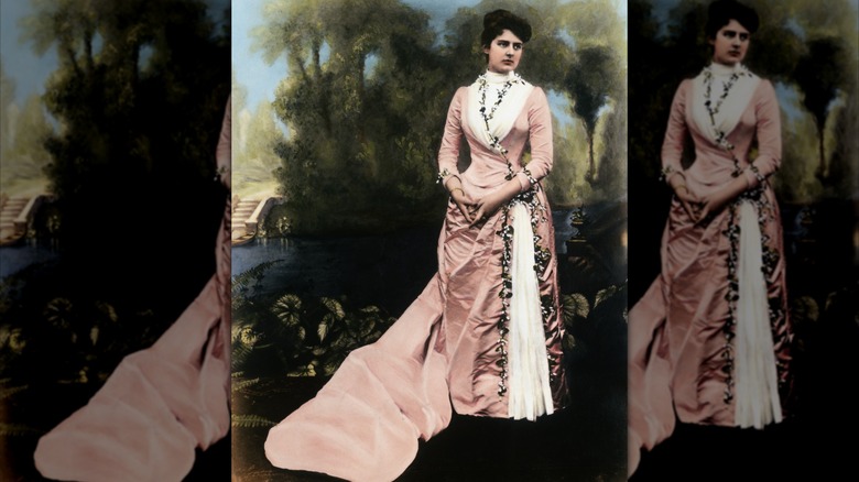 Frances Folsom Cleveland wearing a satin gown with floral decorations