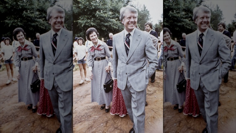 Rosalynn Carter walking through crowd with Jimmy Carter and their daughter