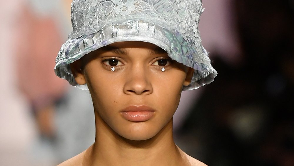 model in the Anna Sui show wearing an old-school makeup trend