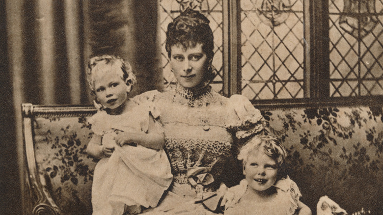 Mary of Teck with Princes Albert and Edward on her lap