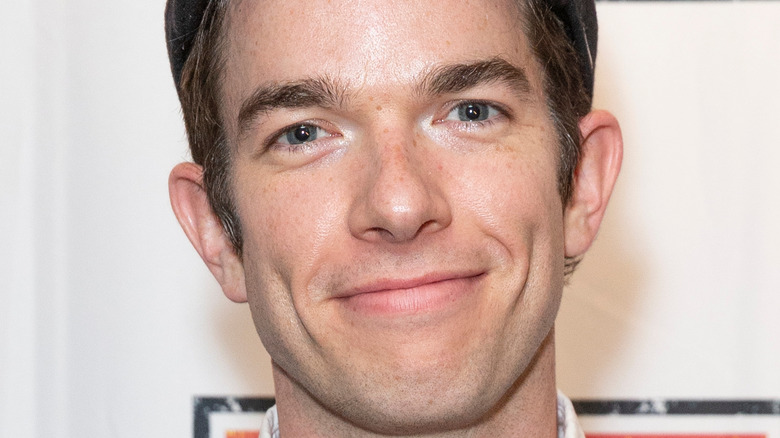 John Mulaney smiling