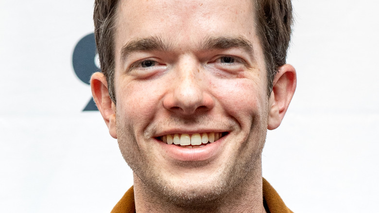 John Mulaney smiling