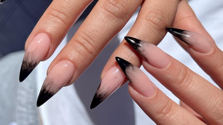 Close-up of black ombre nails 