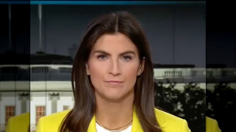 Kaitlan Collins wearing bright yellow
