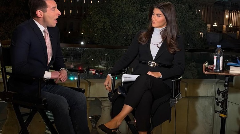 Kaitlan Collins sits on set