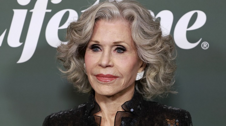 Jane Fonda posing on a red carpet.