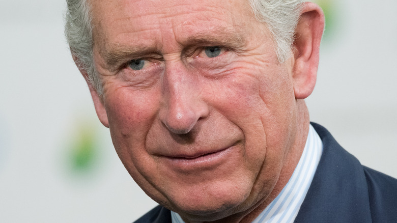 King Charles III slight smile