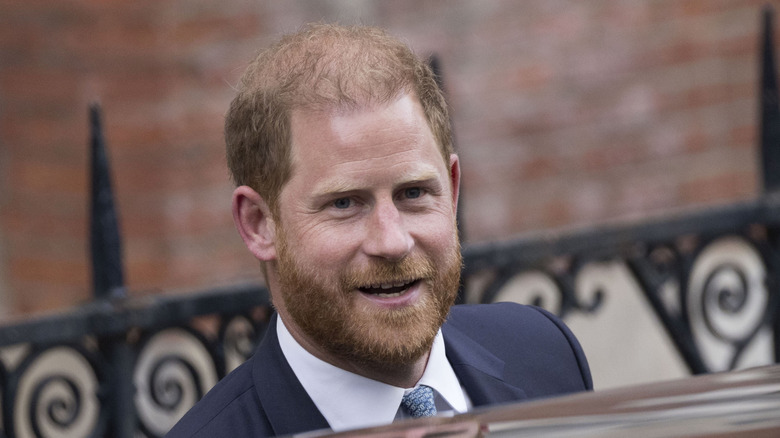 Prince Harry smiling in public