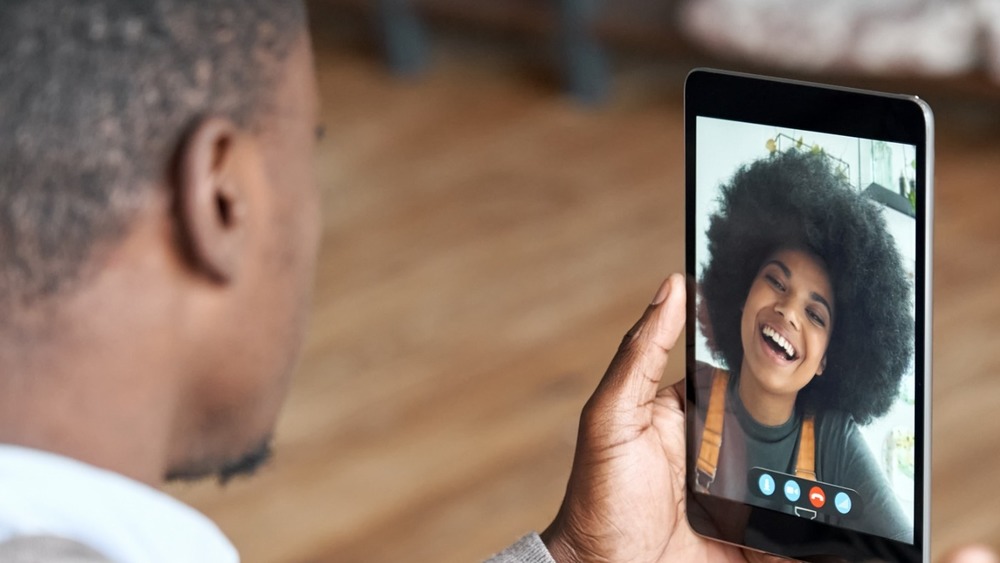 Man facetiming woman