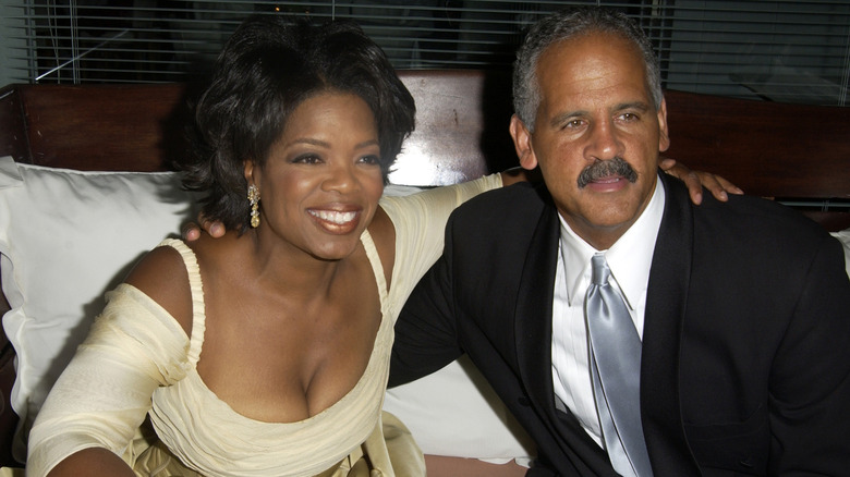 Oprah Winfrey and Stedman Graham posing with arms around each other