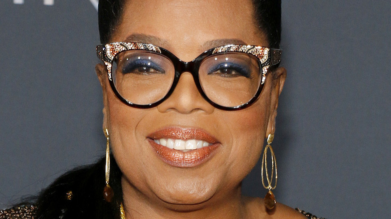 Oprah WInfrey in glasses smiling