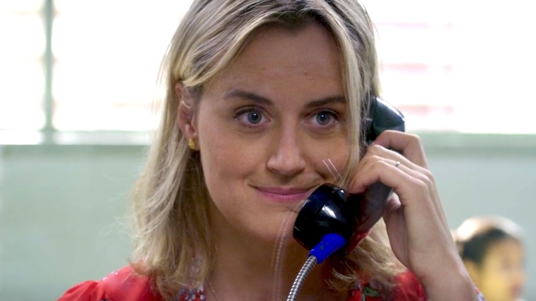 Piper Chapman on a prison phone in the season 7 trailer of Orange Is the New Black
