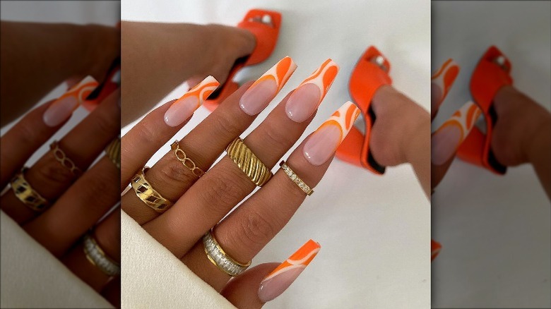 Orange nail designs are *the* look for fall—and these zingy but minimalist  designs are our faves