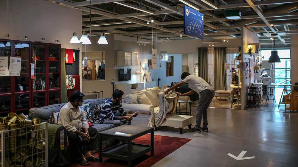 IKEA customers inspecting furniture