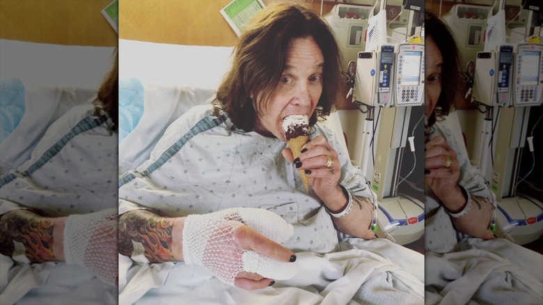 Ozzy Osbourne eats ice cream in a hospital bed