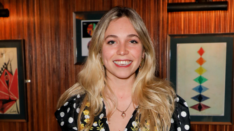 Ayesha Shand smiles at an event