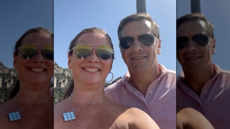Kristine and Todd Blanche pose for a sunny selfie while on vacation in Spain.