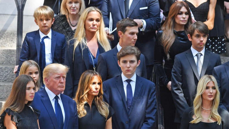 Kimberly Guilfoyle standing with the Trump family