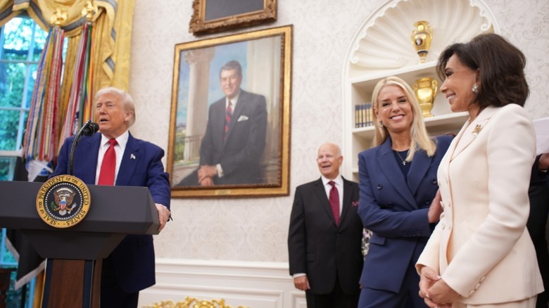 Donald Trump speaks as Pam Bondi embraces Jeanine Pirro during her swearing in ceremony (2025)