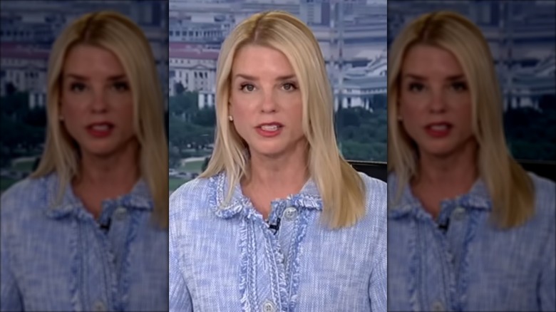 Pam Bondi speaking on Fox News in blue jacket
