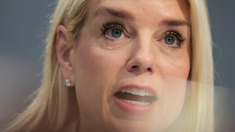 Pam Bondi at the 2025 House Appropriations Committee hearing looking up with mouth open