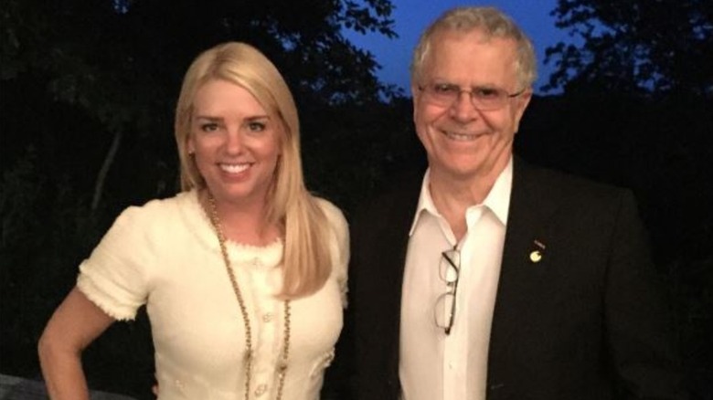 Pam Bondi poses with Homer Hickam in 2015