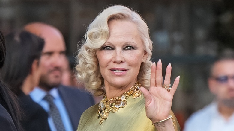 Pamela Anderson waving