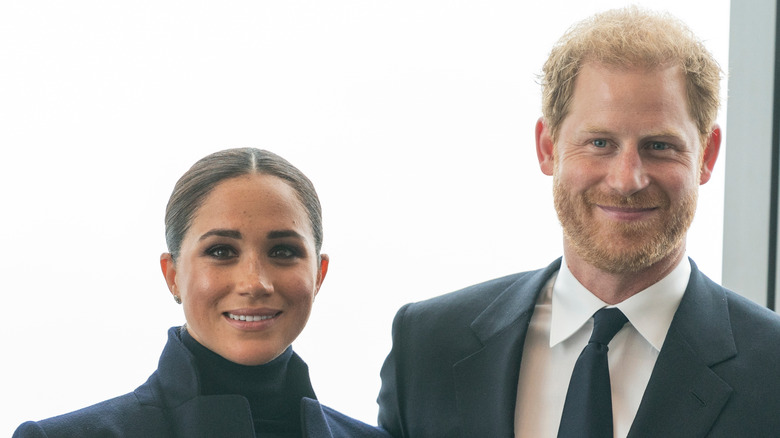 Harry and Meghan smiling