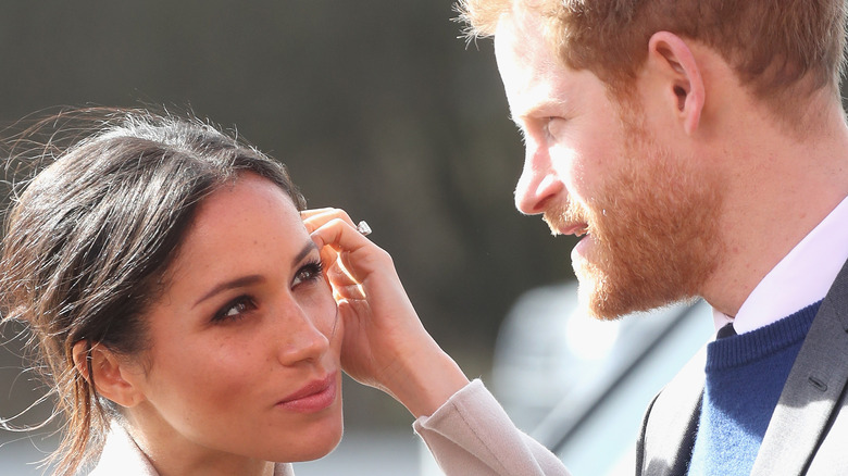 Prince Harry and Meghan Markle at an event. 
