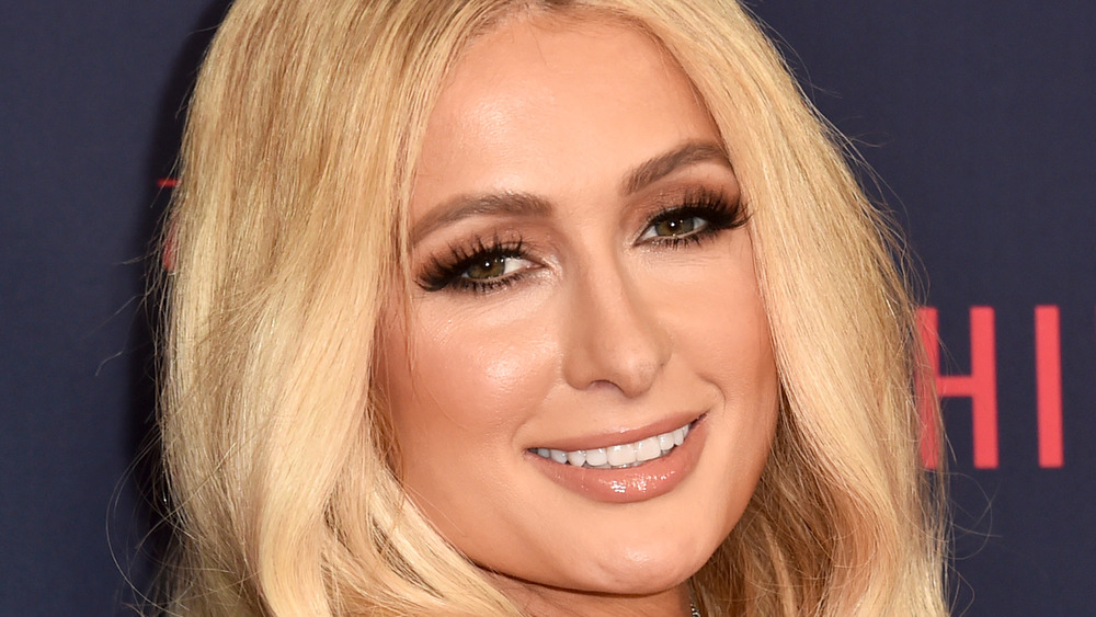 Paris Hilton smiling at event