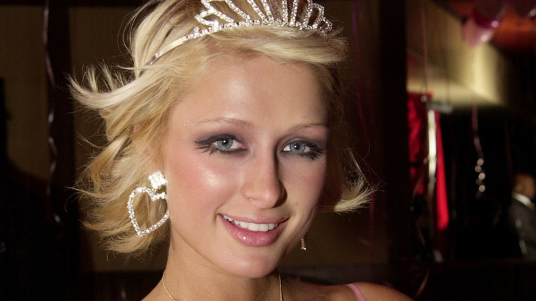 Paris Hilton smiling in a tiara