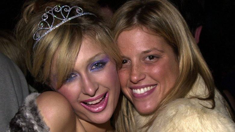 Paris Hilton and uncredited friend smiling