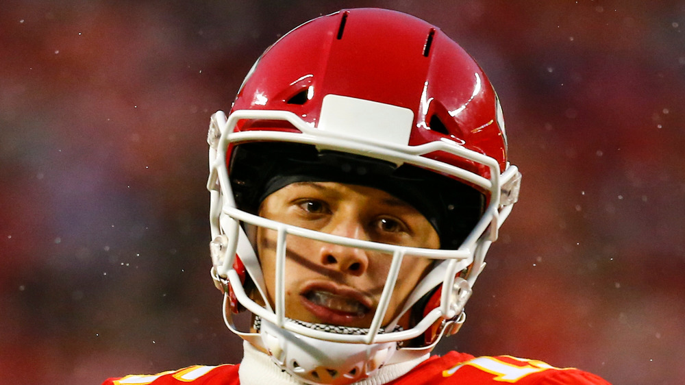 Patrick Mahomes throws the ball on the field