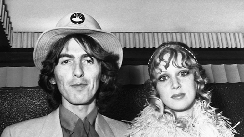 George Harrison and Pattie Boyd posing together.